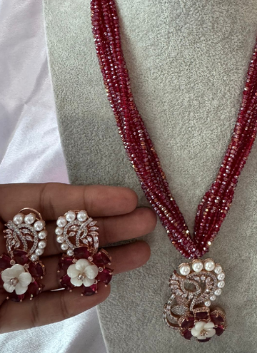 Mesmerizing Wine colored Twisted Onxy bead necklace set.